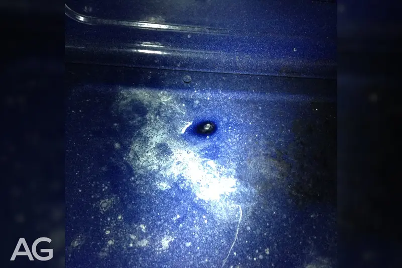 Aluminum foil damage to porcelain enamel on an oven bottom