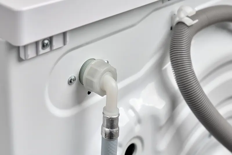 Washer water supply hose connection
