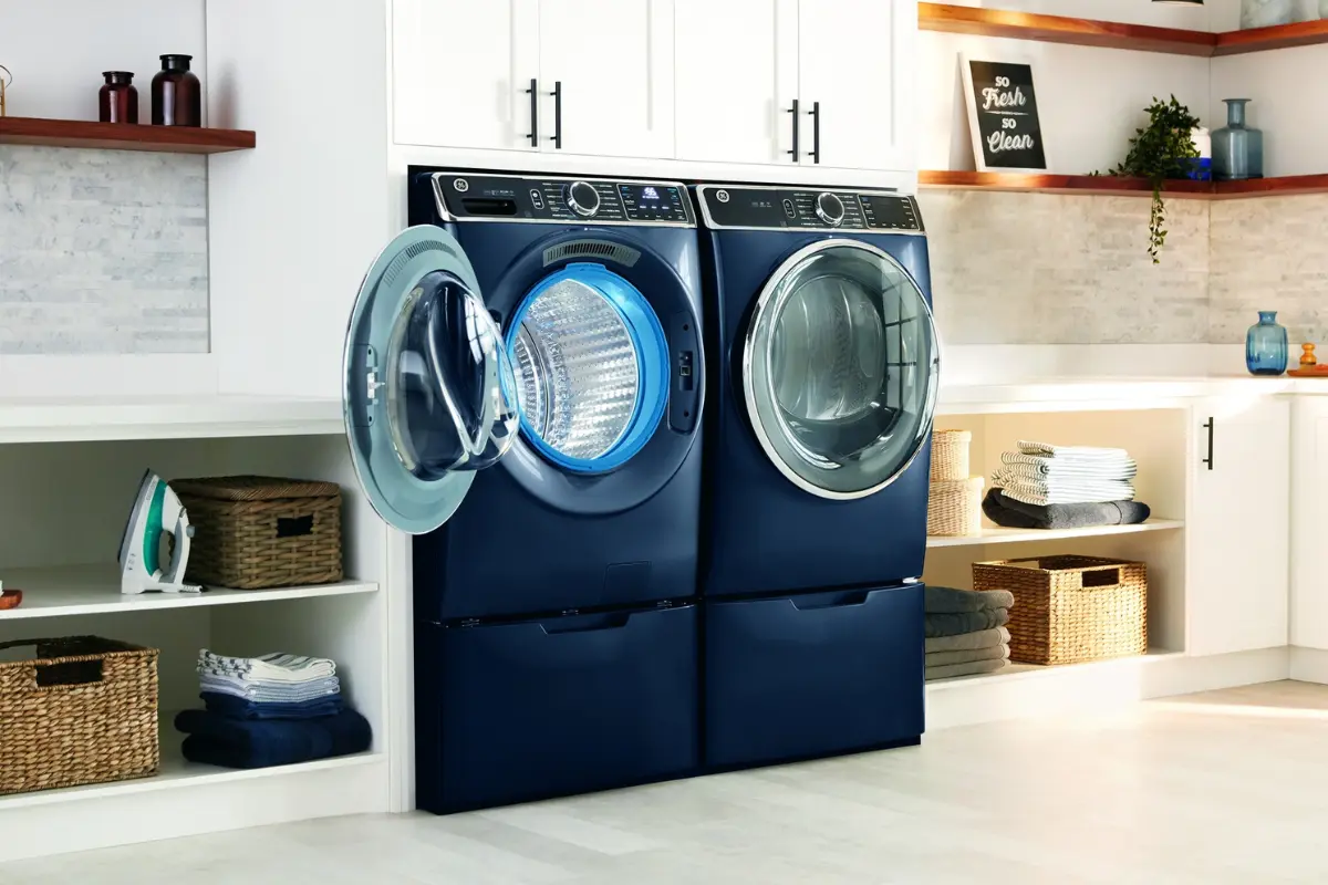 GE front-load washer and dryer in a bright laundry room