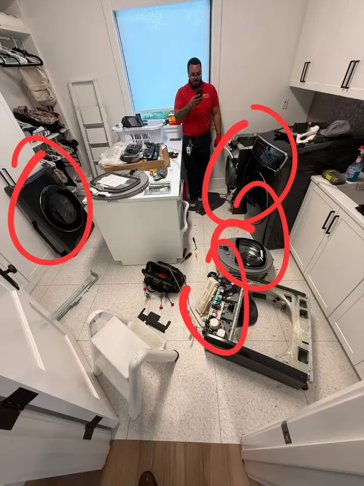 Samsung FlexWash disassembled for a lid replacement in a Miami laundry room, with removed assemblies circled in red